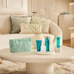 The Ritual of Karma gift set shower gel 200 ml + body cream 150 ml + scented candle 140 g + fragrance sticks 70 ml + hand cream