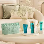 The Ritual of Karma gift set shower gel 200 ml + body cream 150 ml + scented candle 140 g + fragrance sticks 70 ml + hand cream