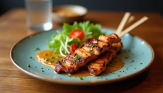 Chicken satay as a popular dish in Czech restaurants